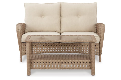 Ashley Furniture Braylee Outdoor Loveseat with Table (Set of 2) in Driftwood
