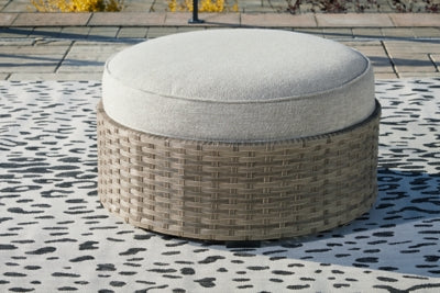 Ashley Furniture Calworth Outdoor Ottoman with Cushion 0