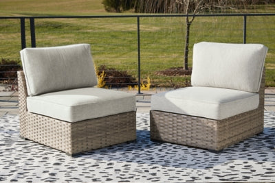 Ashley Furniture Calworth Outdoor Armless Chair with Cushion (Set of 2) 0